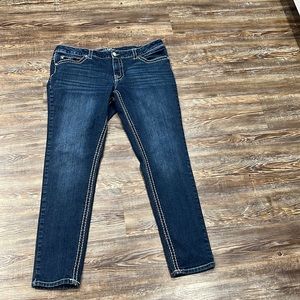 Blue jeans with rhinestones on the pockets